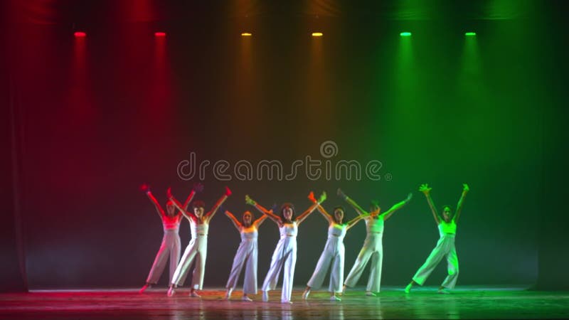 Dancers on Stage with Colorful Lighting during a Contemporary ... Dancers on Stage with Colorful Lighting during a Contemporary ...